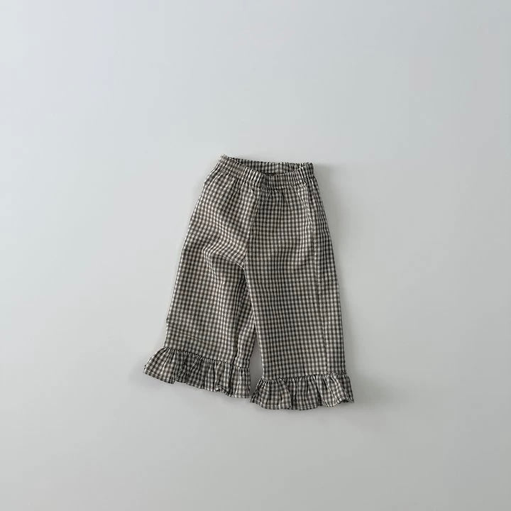 Pantaloni în carouri cu volanase